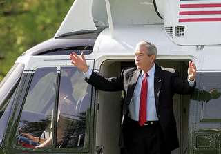 President Bush exits Marine One at the start of his four-hour visit to Washington's White House.